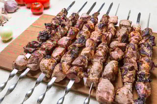 Grilled kebabs on metal skewers