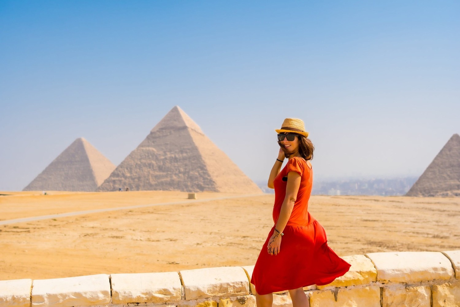 A Girl Posing In Front Of Pyramids Of Giza