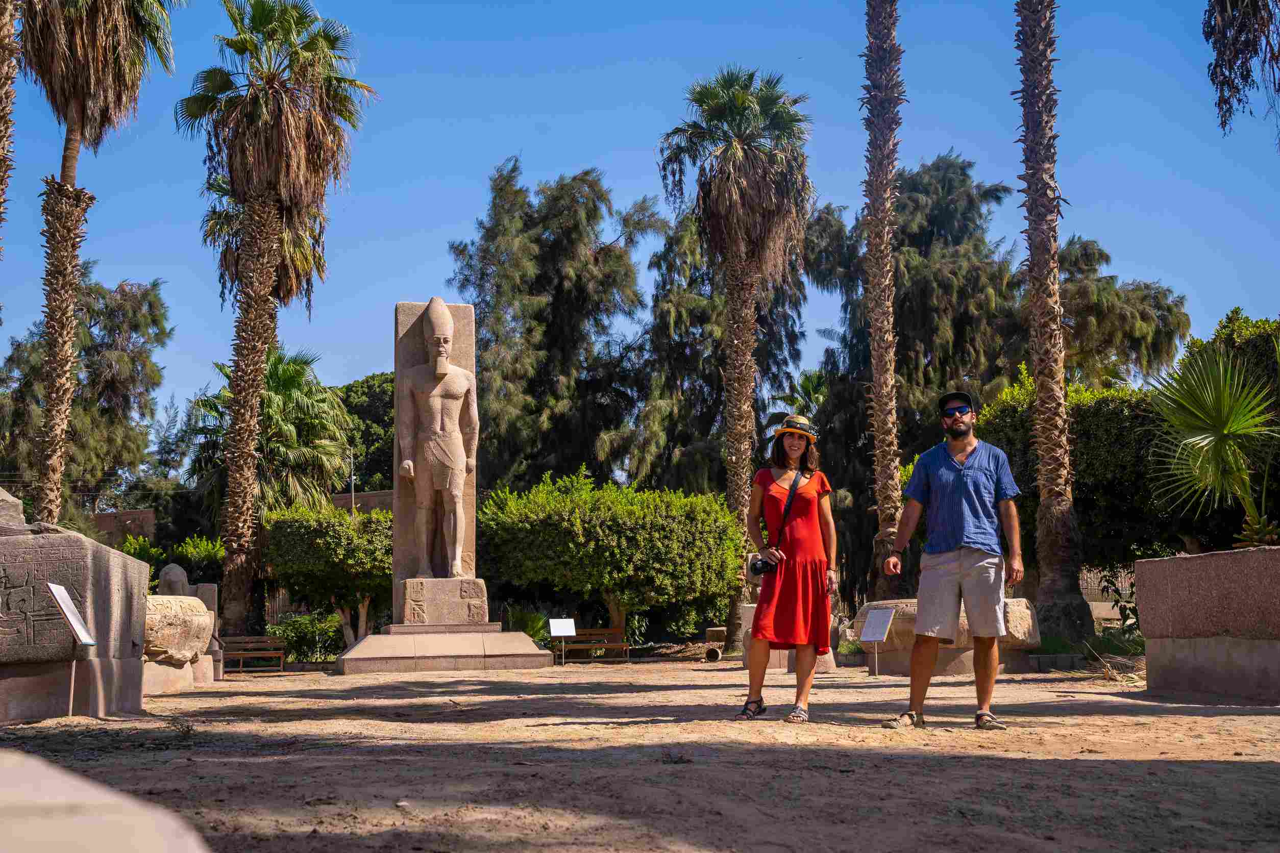 https egypt eta com images a tourist couple visiting the sculpture of pharaoh ramses ii at memphis in cairo egypt