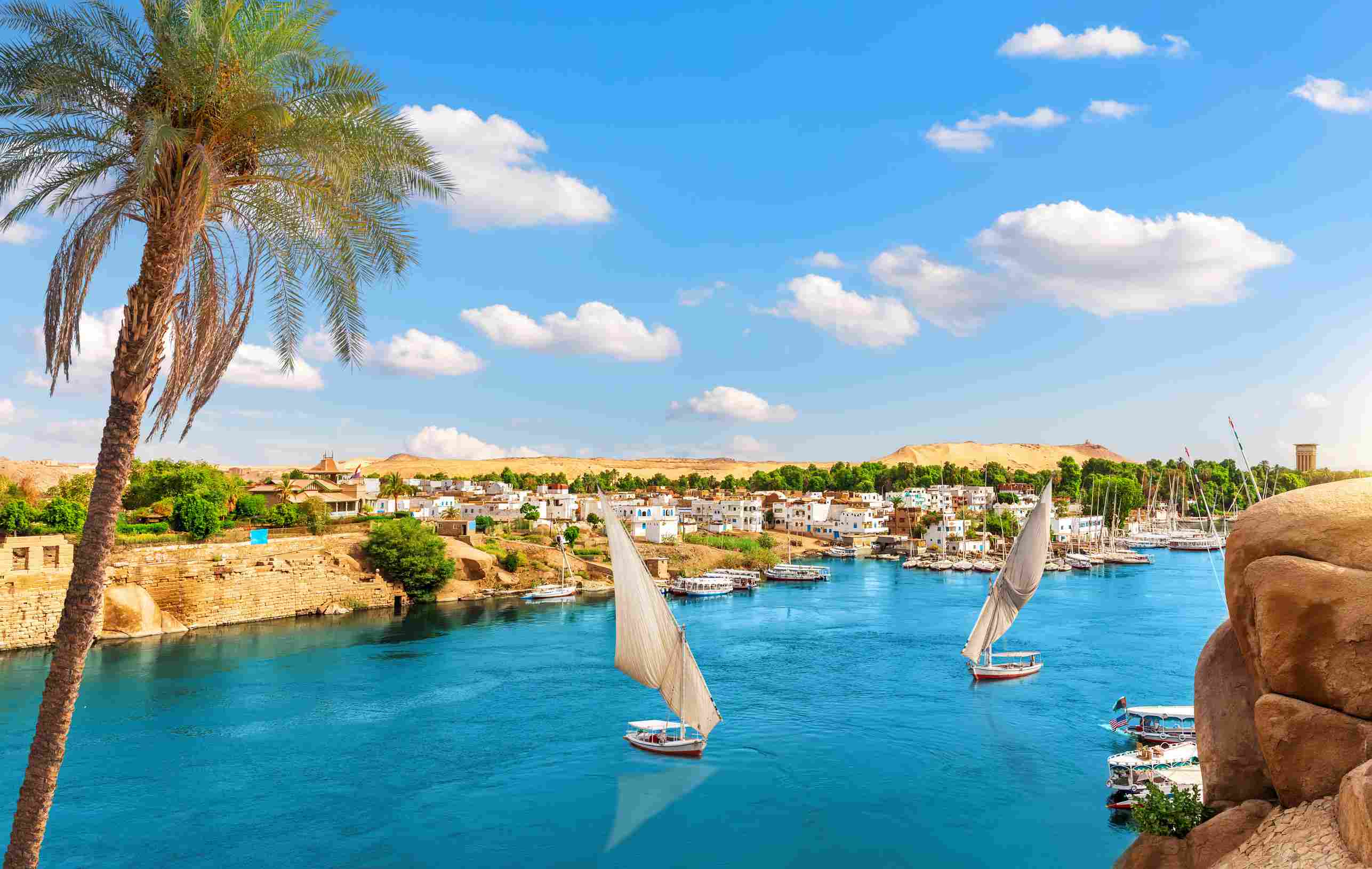 https egypt eta com images aerial view on aswan villages by the nile behind the palm egyp