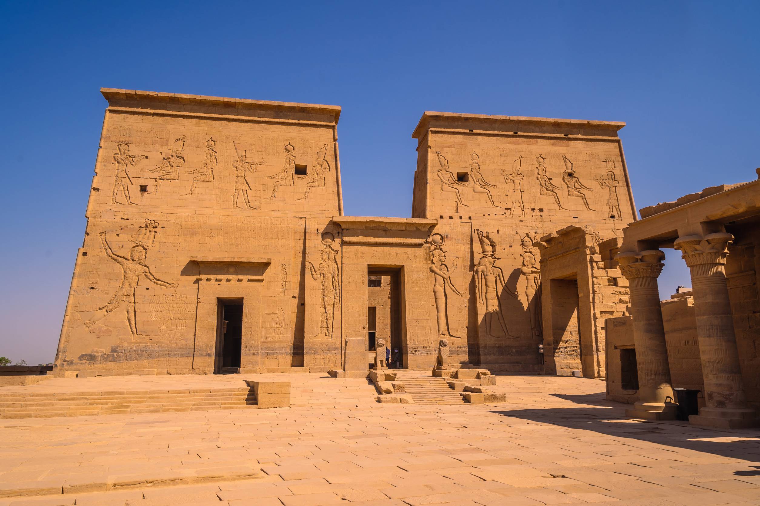 https egypt eta com images entrance with beautiful pharaohs in the temple of philae without people greco roman construction