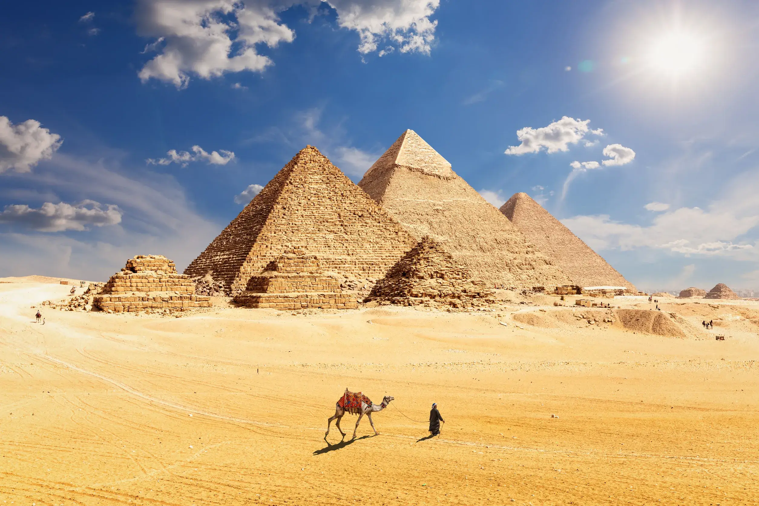 https egypt eta com images famous pyramids of egypt and a bedouin with a camel giza cairo
