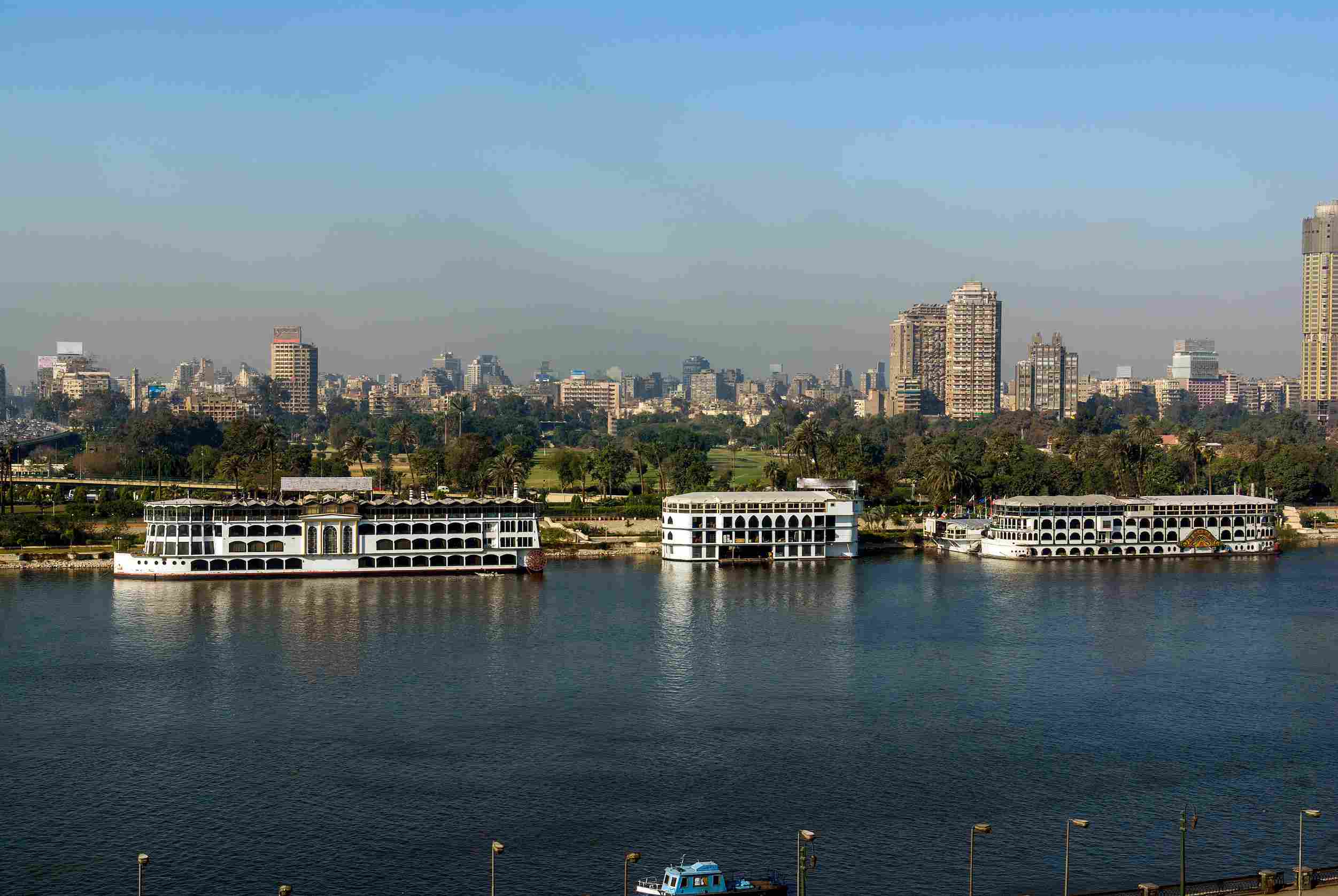 https egypt eta com images ile river on its way through the city of cairo egypt with boats moored on the shore and view
