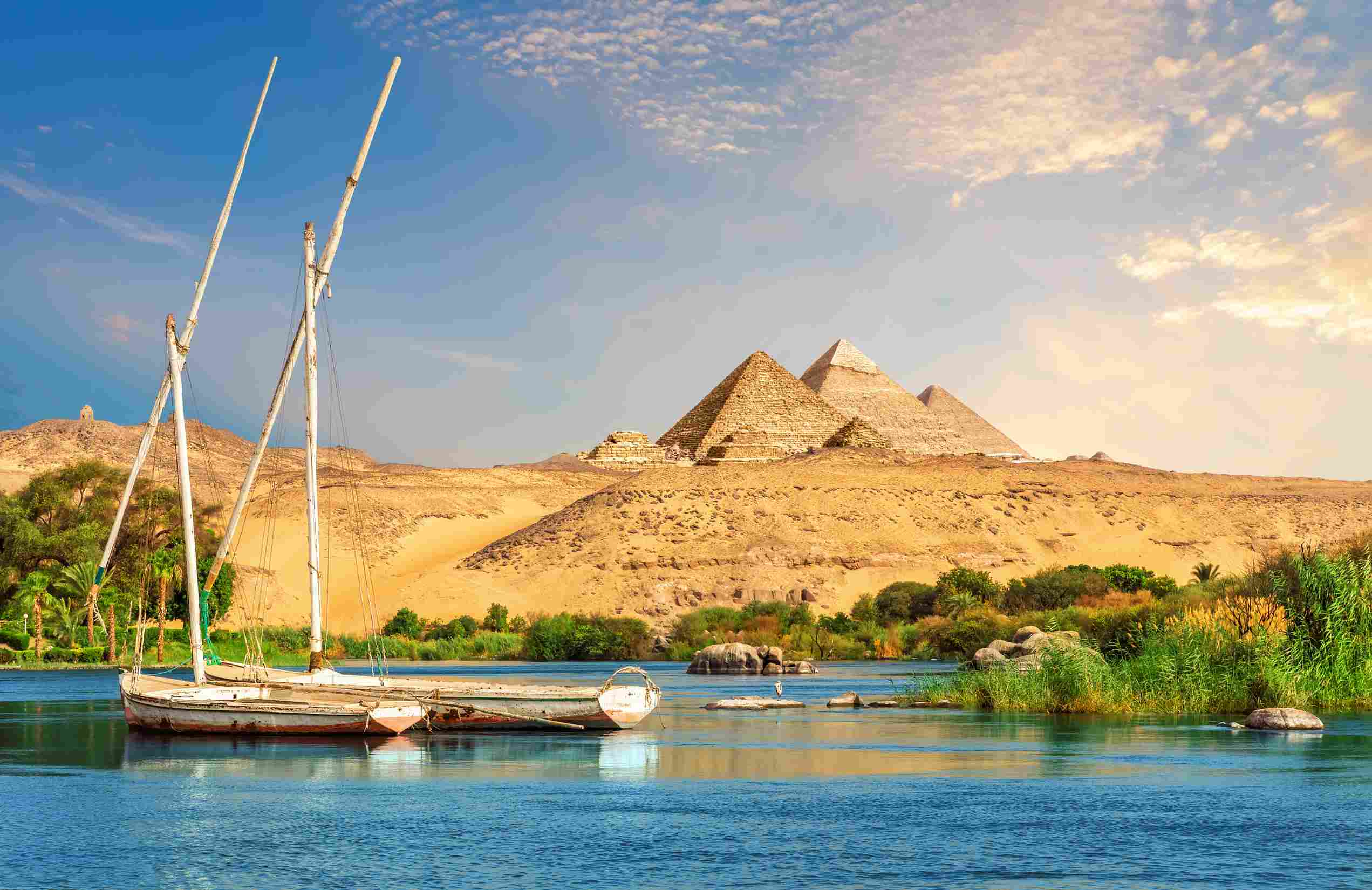 https egypt eta com images landscape of aswan with sailboats in the nile on the way to pyramids egypt