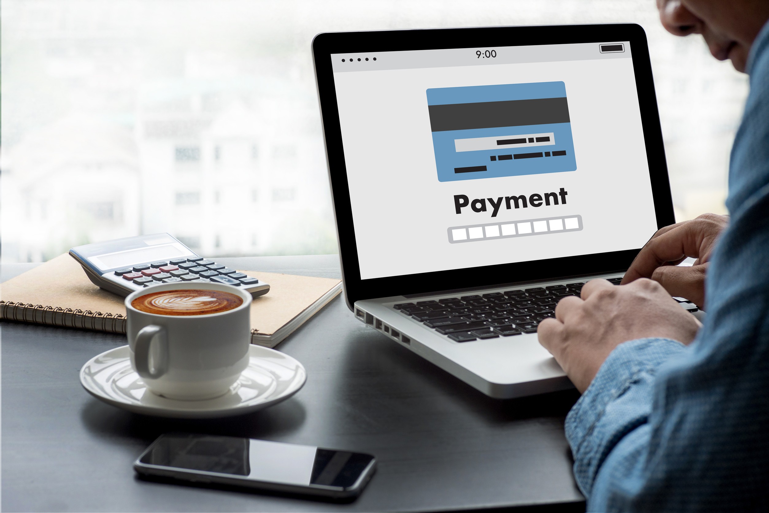  Person making online payment laptop