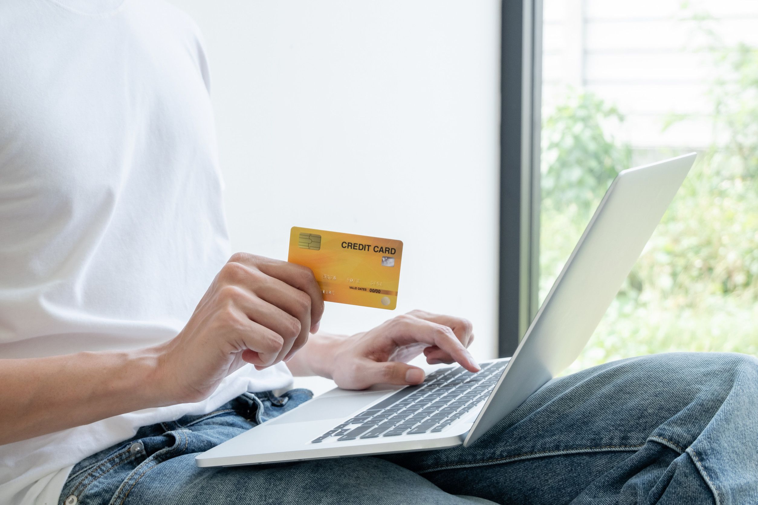  Person making online payment with card