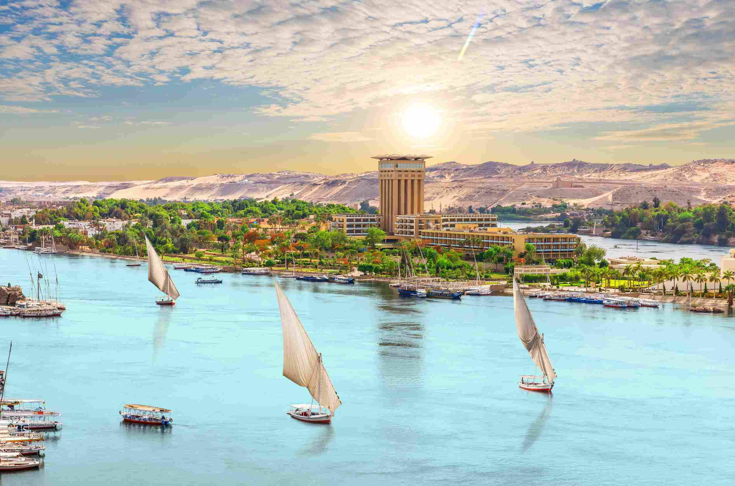 https egypt eta com images sailboats of the nile beautiful sunset over aswan city egypt