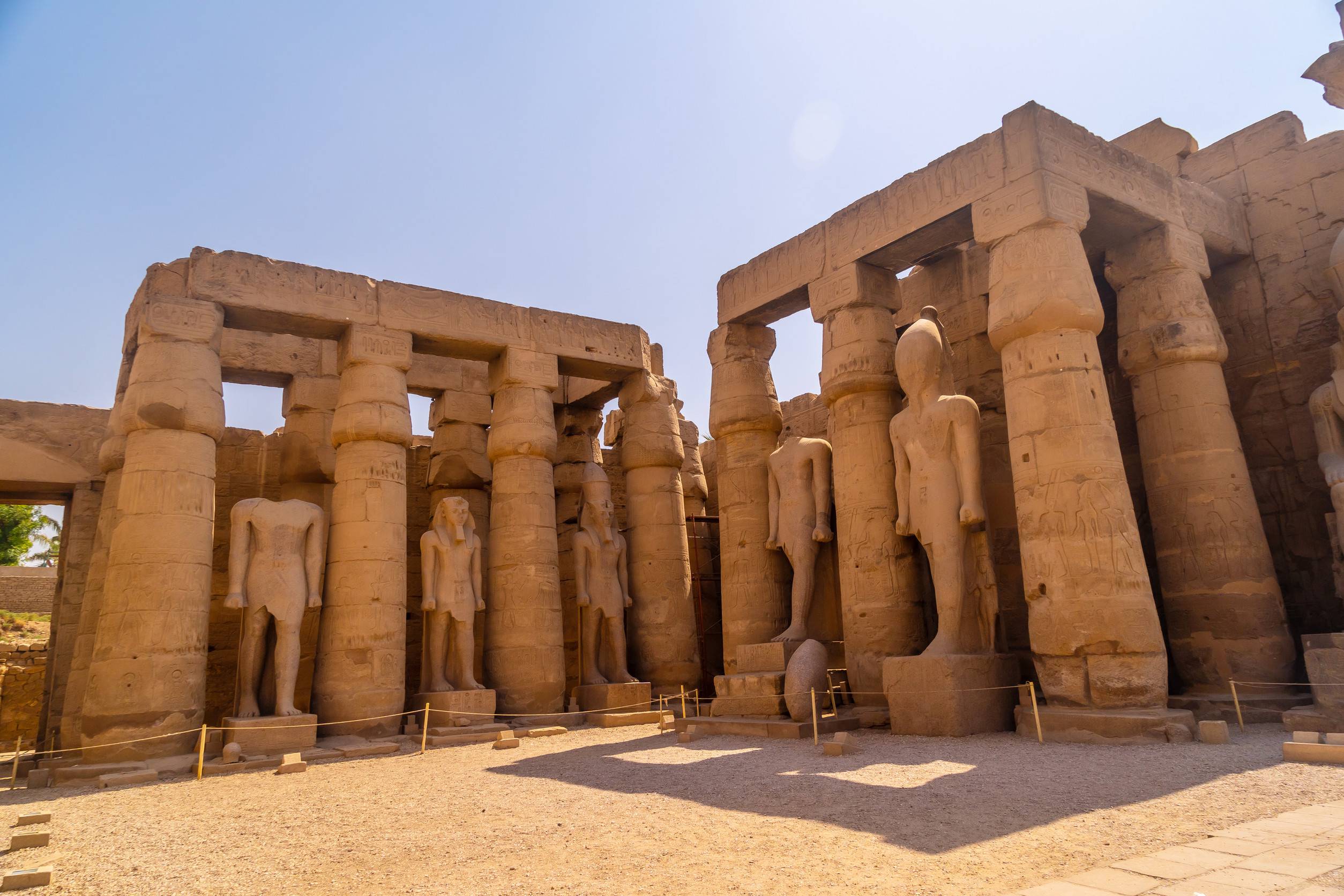 https egypt eta com images sculptures of pharaohs and ancient egyptian drawings on the columns of the luxor temple egypt