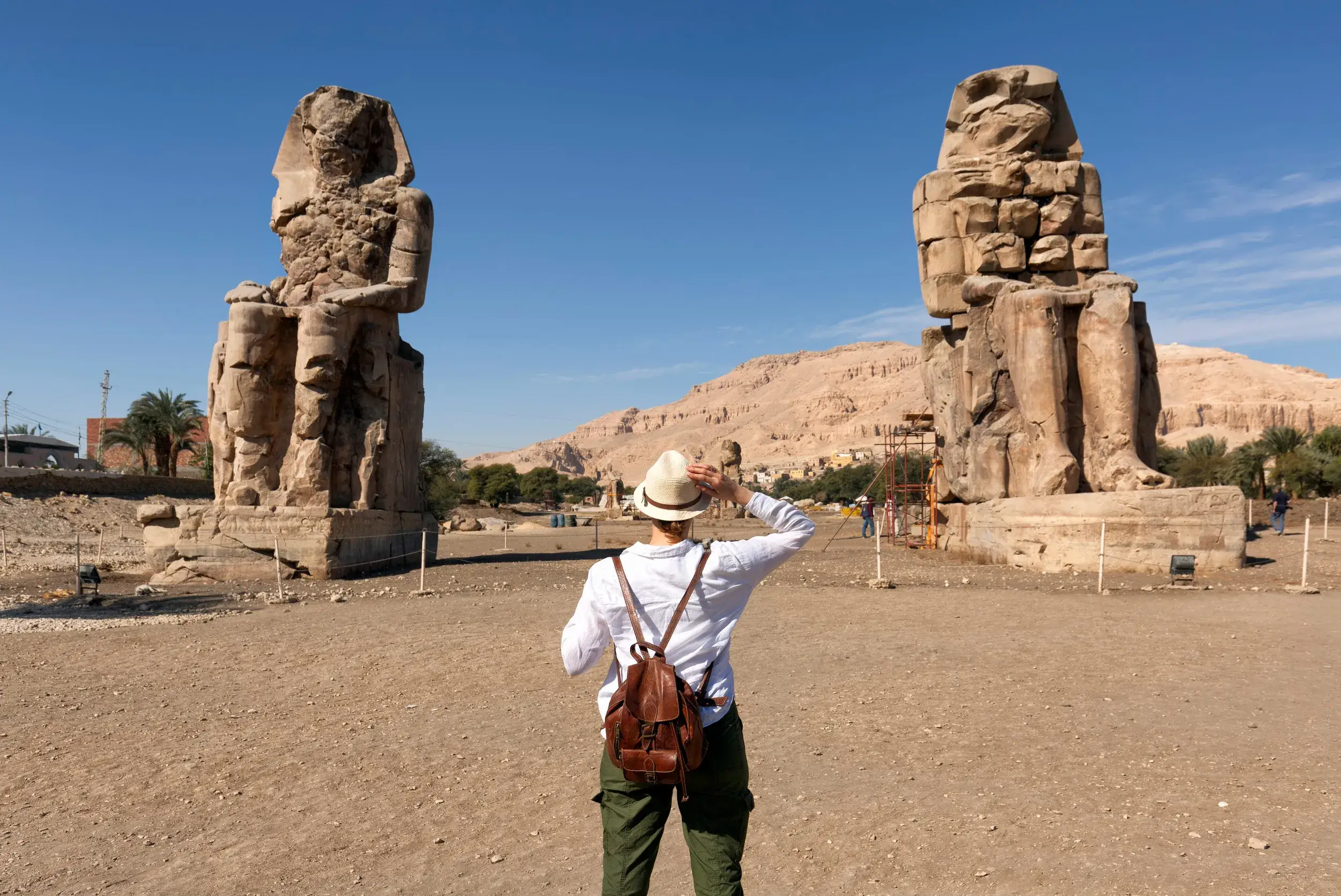 https egypt eta com images tourist girl interested in egyptology and archeology and gets a travel experience at the memnon