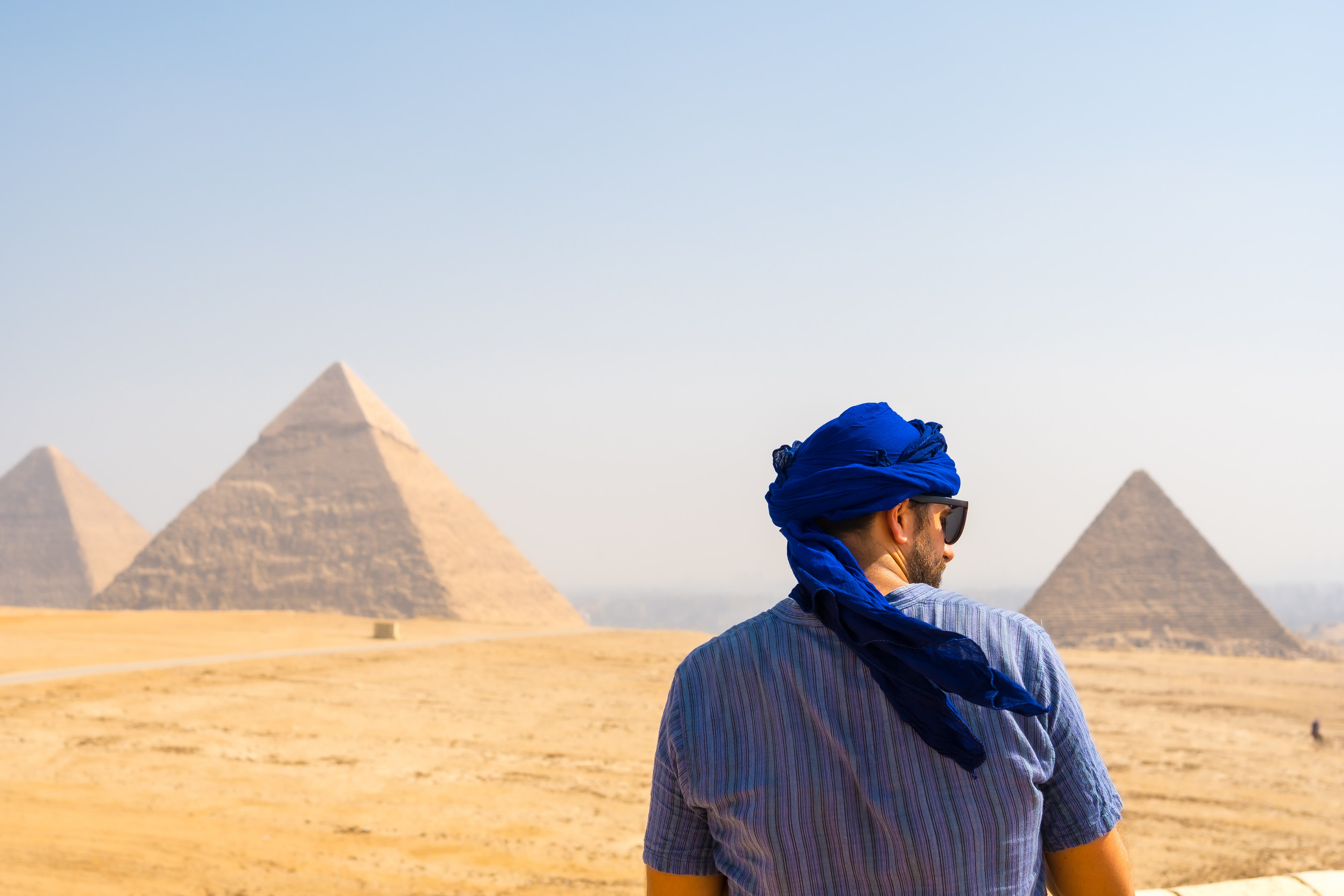 Tourist overlooking pyramids in Egypt