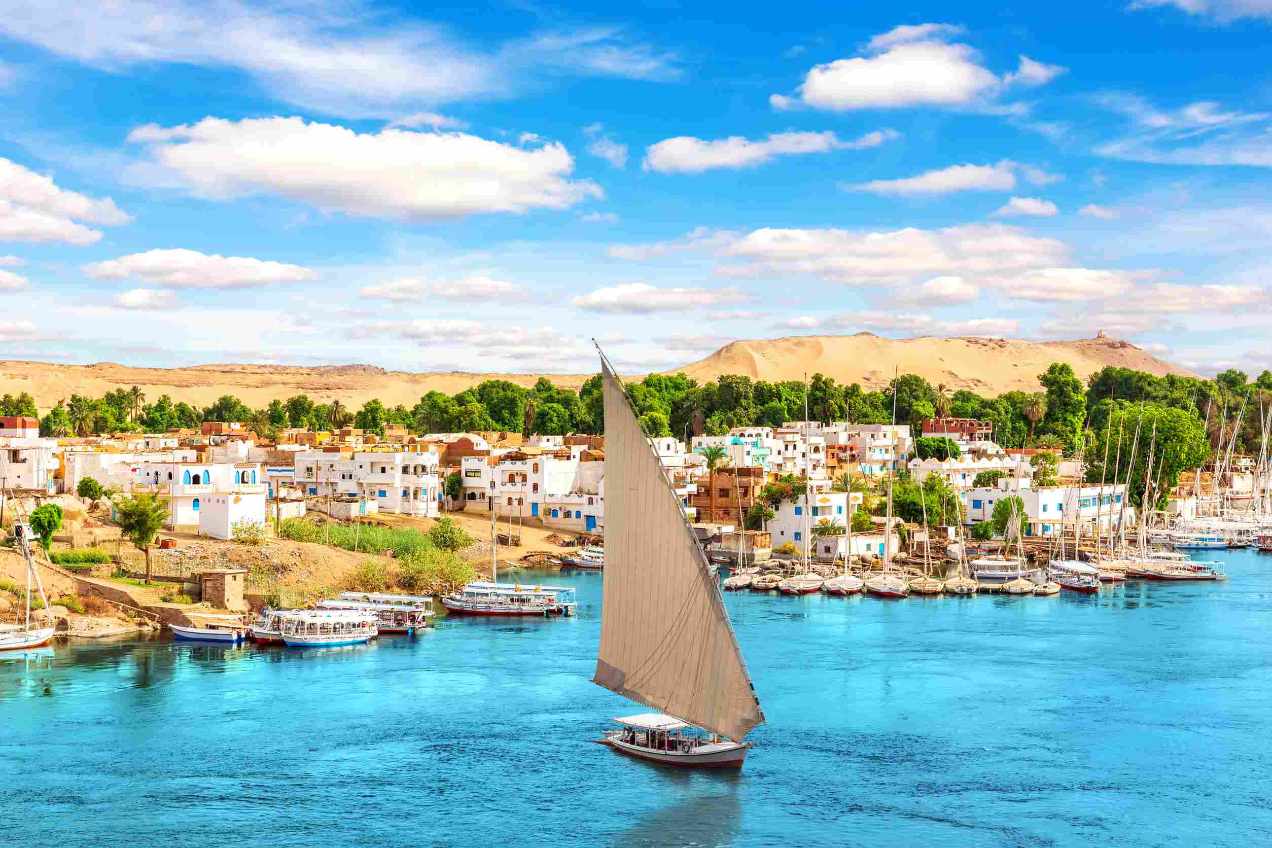 https egypt eta com images traditional buildings of aswan the nile and sailboats egypt
