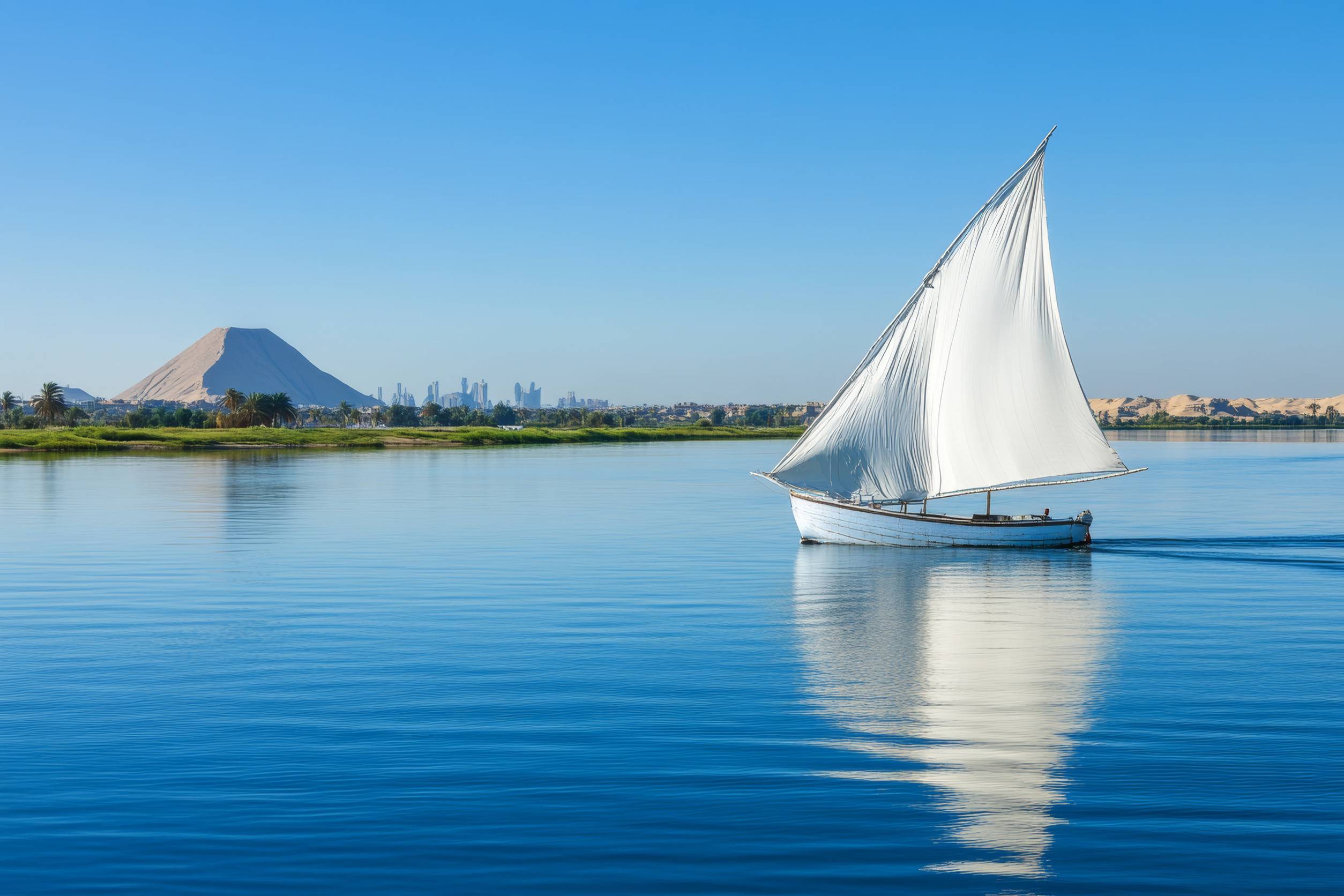https egypt eta com images traditional egyptian sailboat felucca on nile river with giza pyramids background egy