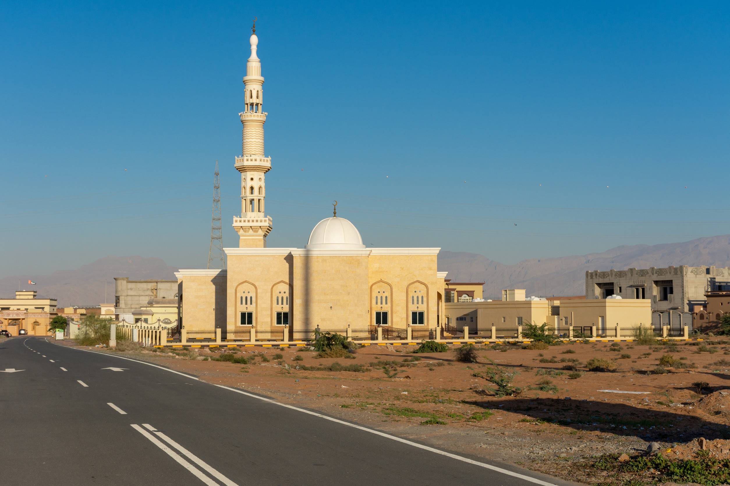 https egypt eta com images white mosque in aresidential area in the middle east with a blue sky in the late afternoon sun
