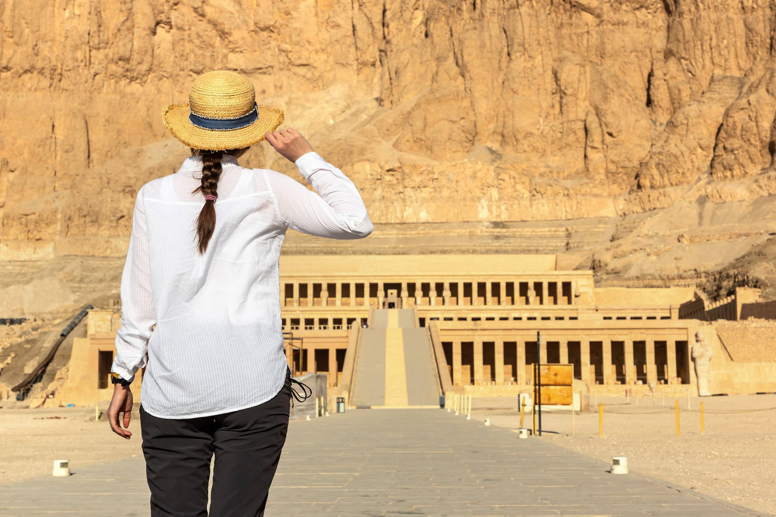 Woman Traveler At Temple Of Queen Hatshepsut Valley Of The Kings Egyp