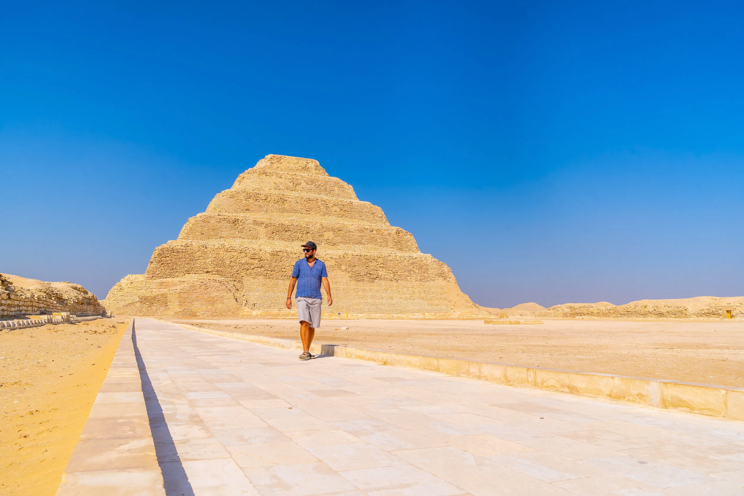 https egypt eta com images young man walking in the stepped pyramid of djoser saqqara egypt the most important